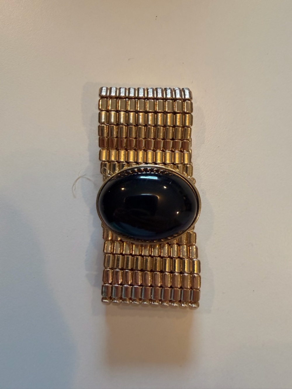 Gold Stretch Bracelet with Black Oval Cabochon